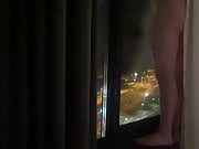 Nude hotel window flash