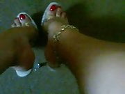 clear heels and red toe nails